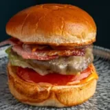 https://eatsy.devbrilliance.com/wp-content/uploads/2026/02/Bacon-Blue-Smash-Burger-Just-eat-160x160.webp