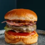 https://eatsy.devbrilliance.com/wp-content/uploads/2026/02/Bacon-Cheese-Smash-Burger-Just-eat-160x160.webp